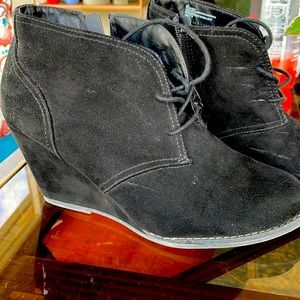 Slightly used black ankle booties.  Suede like material.  Tie closure.